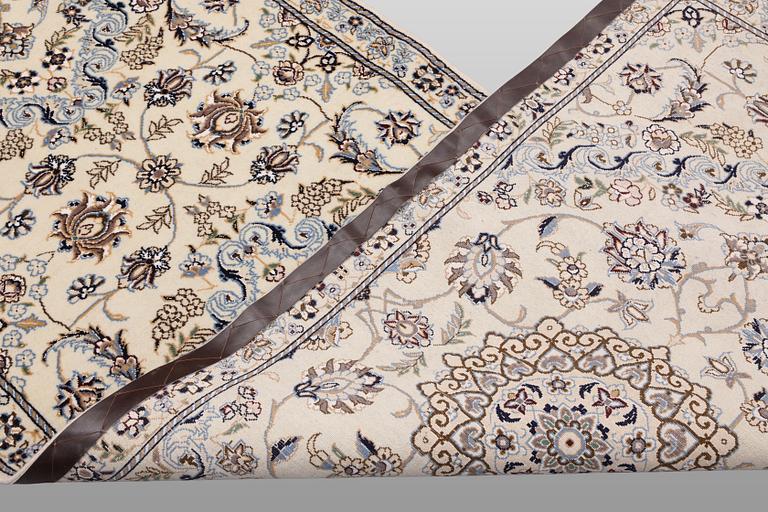 A Nain part silk runner carpet, 311 x 88 cm.