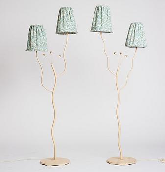 Swedish Modern, two lacquered metal floor lamps, 1940's-50's.