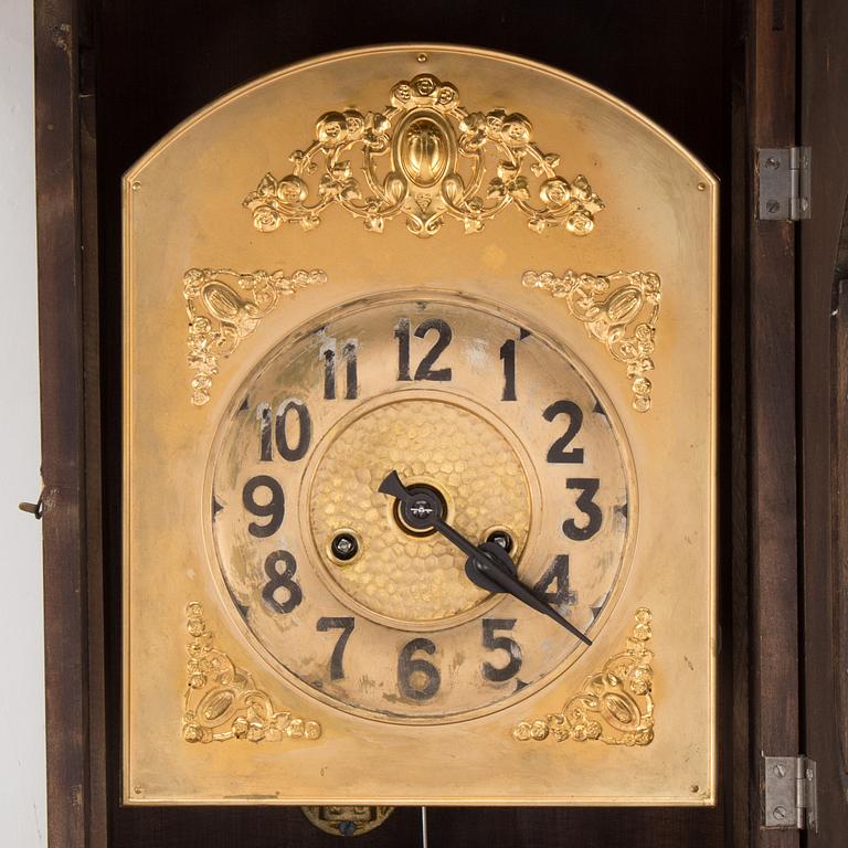 A mahogany wall clock, c. 1900.