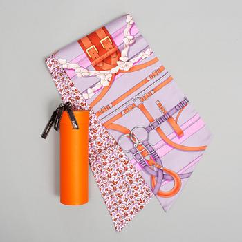 Hermès, a Maxi Twilly, 'Grand Manège' silk scarf.