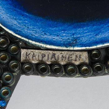 Birger Kaipiainen, reliefi, signeerattu Kaipiainen.