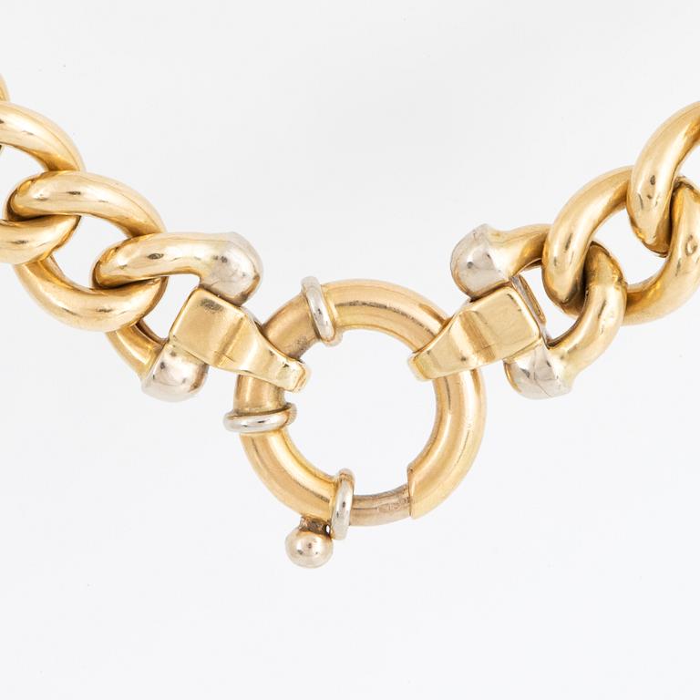 18K gold curb link necklace.