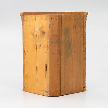 A folk art corner cabinet from Delsbo, Hälsingland, dated 1865.