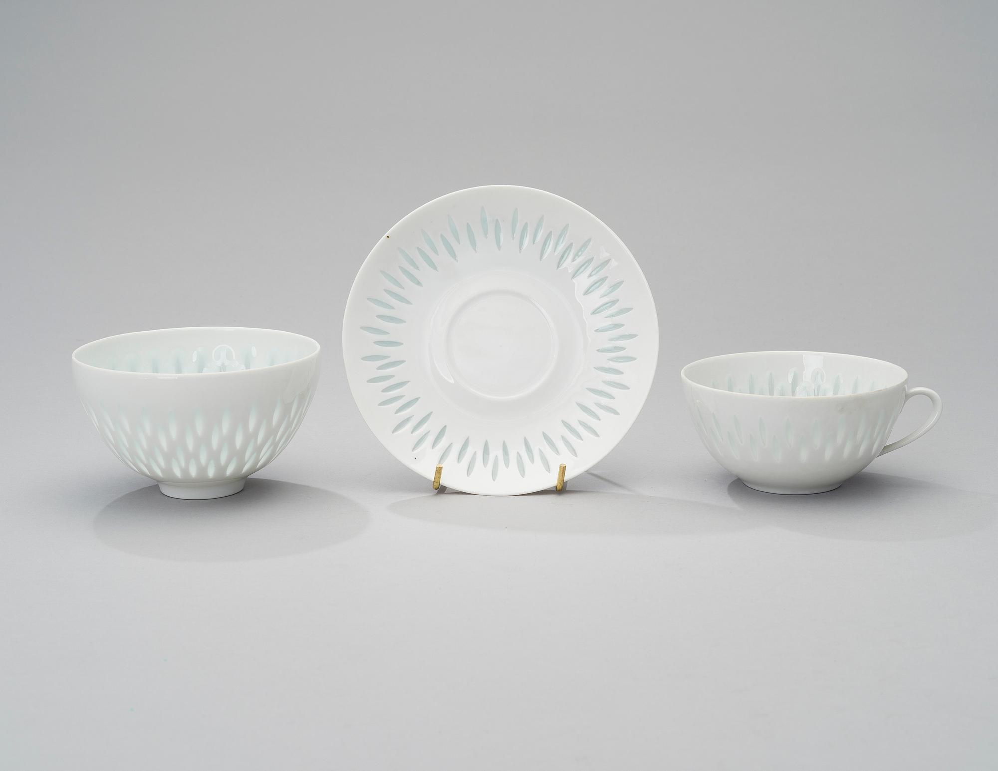 FRIEDL HOLZER-KJELLBERG, 8 TEA CUPS WITH SAUCERS, AND BOWL, rice grain porcelain, signed, Arabia.