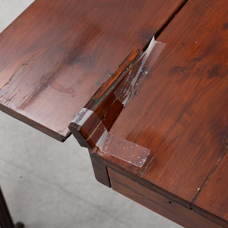 A pair of tables, England, early 19th century.