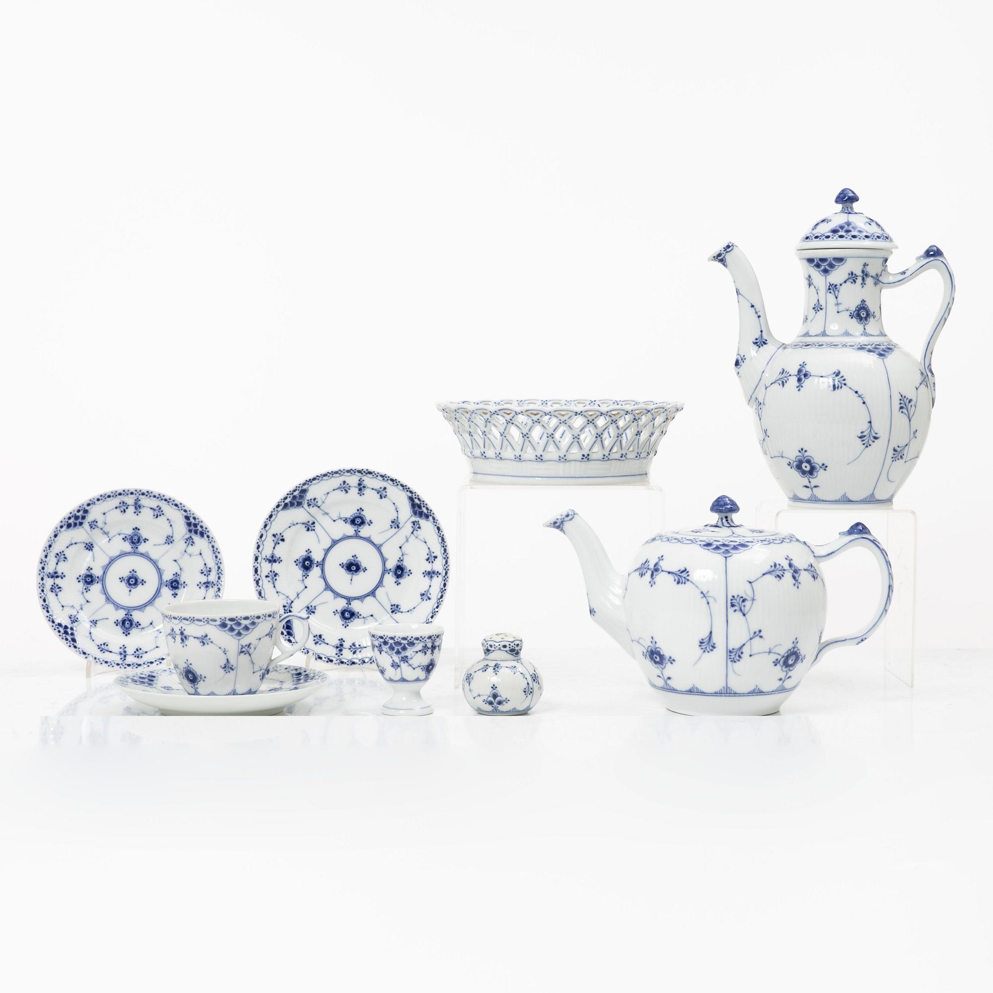 Royal Copenhagen, A 'Blue Fluted Half Lace" 30 pieces breakfast service, 'Musselmalet', partly 1889-1922 but also post 1923.