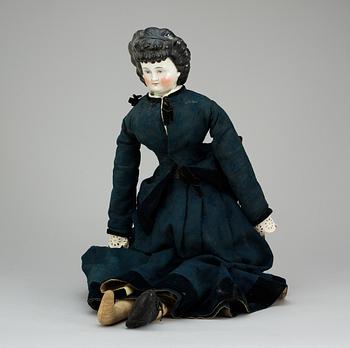 907. A German "China-head" lady doll, about 1870-80.
