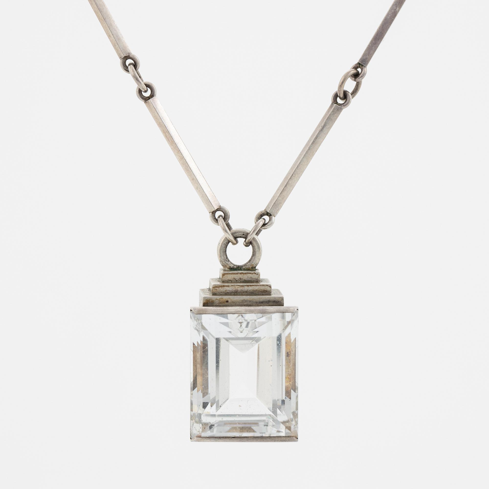 Wiwen Nilsson, hängsmycke, silver med fasettslipad bergkristall, Lund, 1937.