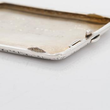 A silver cigarette case, gift from Prince and Princess Viggo, maker's mark of S. Christian Fogh, Copenhagen 1937.