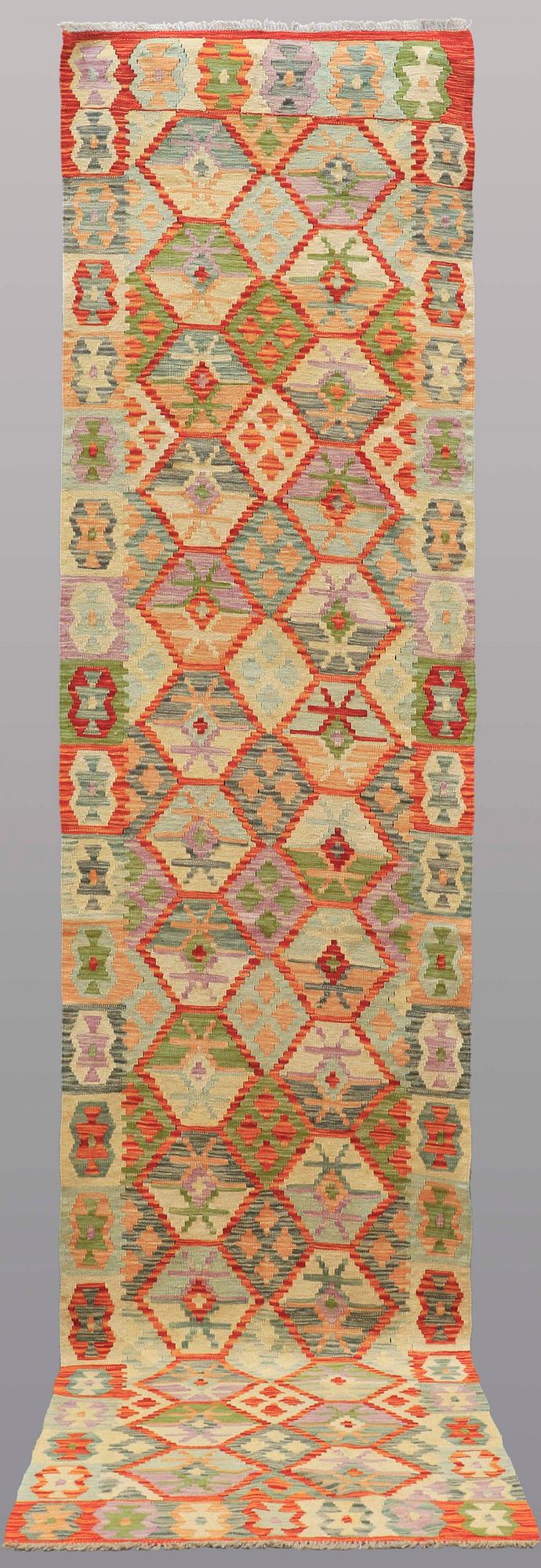 A runner kilim, ca 391 x 88 cm.