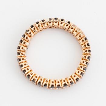 Black and colourless diamond ring.