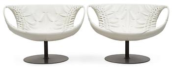 104. A pair of Patricia Urquiola 'Smock' steel and white leather easy chairs, Moroso, Italy.