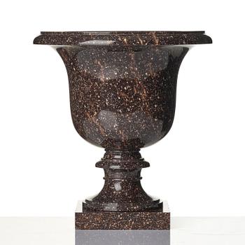 A Swedish Empire 'Blyberg' porphyry Medici shaped urn, early 19th century.