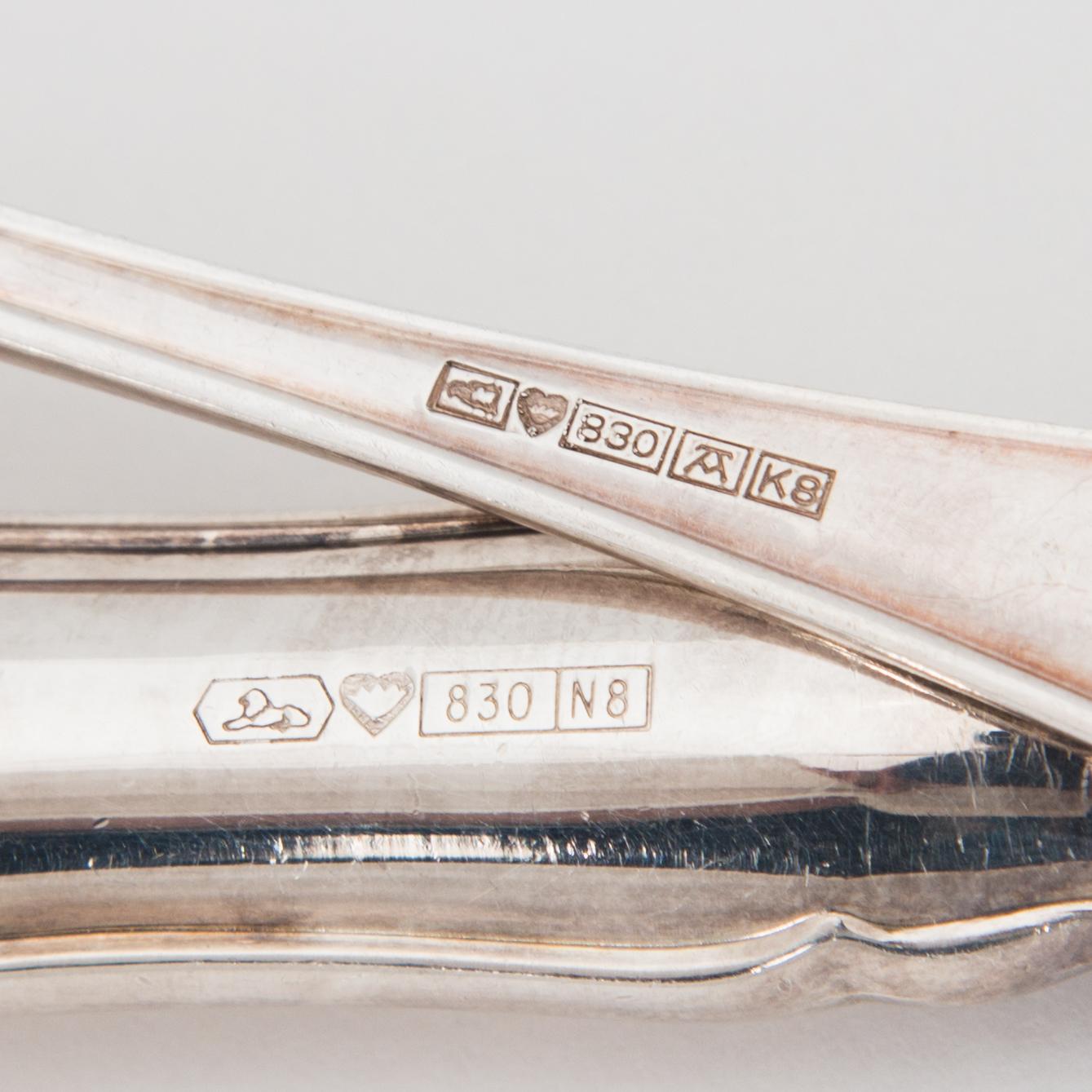 An 82-piece 'Chippendale' silver cutlery set for 12, in cutlery box, Auran Kultaseppä oy, Turku, Finland 1986-87.