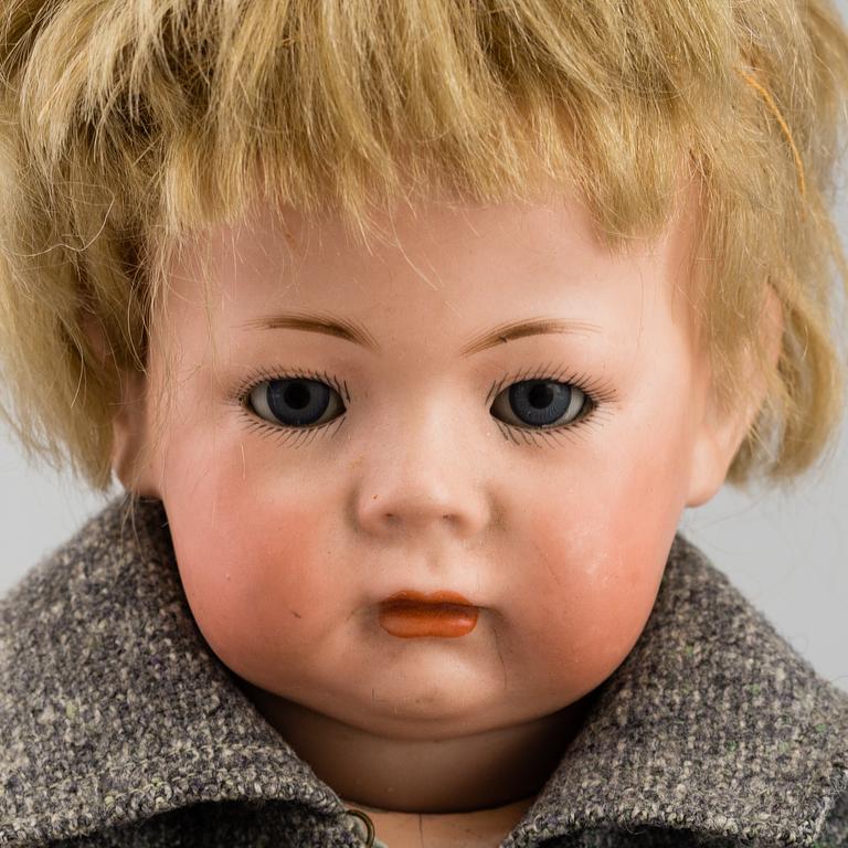 a '115/a' porcelain doll by Simon & Halbig, Germany early 20th century.