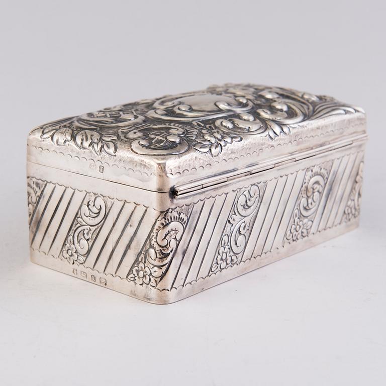 A silver cigar box, mark of A. & J. Zimmerman, Birmingham 1897.