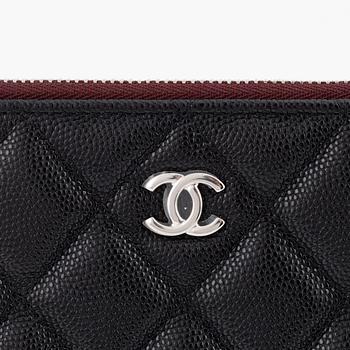 Chanel, a black caviar leather clutch, 2020.