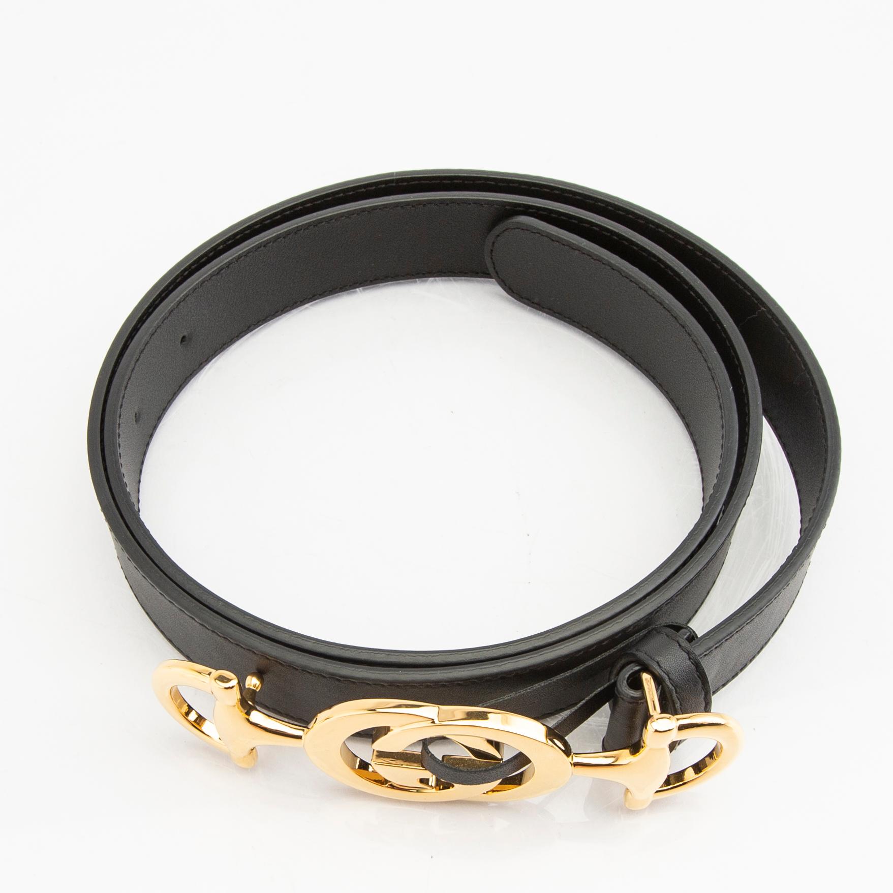 Gucci, belt and shawl.