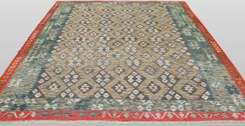 A Kilim carpet, approx. 340 x 262 cm.