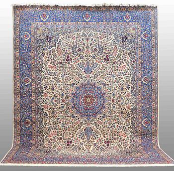 A carpet, Kerman, ca 400 x 295 cm.