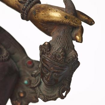 A large Tibetan eight armed deity, probably 20th Century.