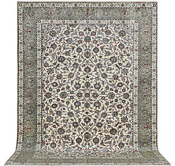 A carpet, Kashan, c. 400 x 280 cm.