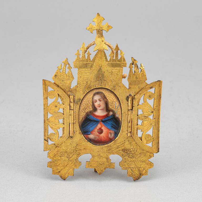 An early 20th century brass icon/frame with Virgin Mary. Possibly Russian.
