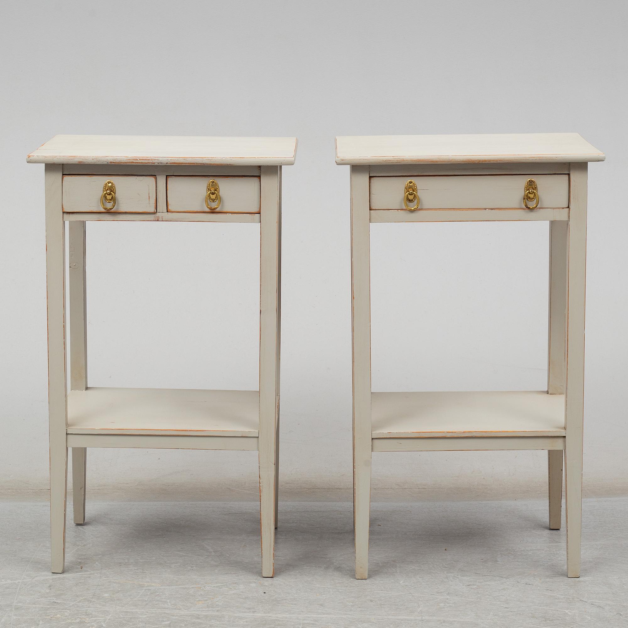A pair of painted pine bedside tables, first half of the 20th Century.