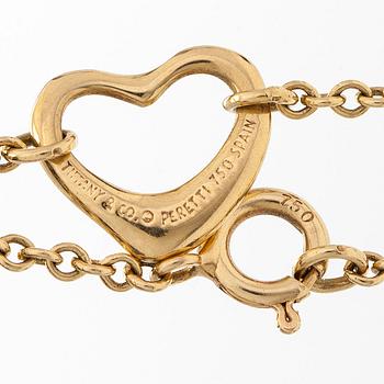 Tiffany & Co, an 18K gold 'Open Heart' bracelet.