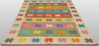 A Kilim rug, approx. 251 x 175 cm.