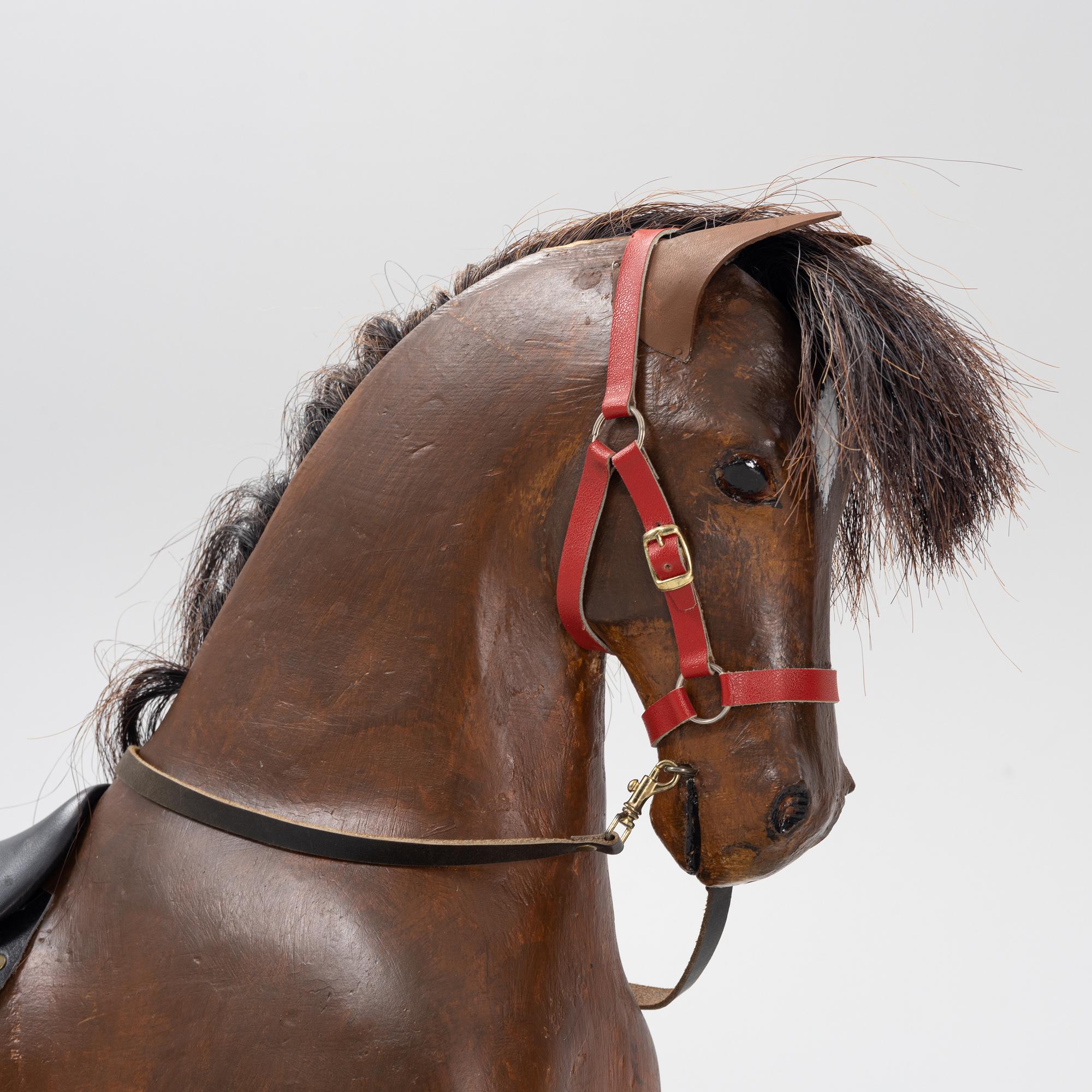 An early 20th century rocking horse.