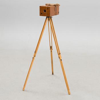 A camera with stand, circa 1900.