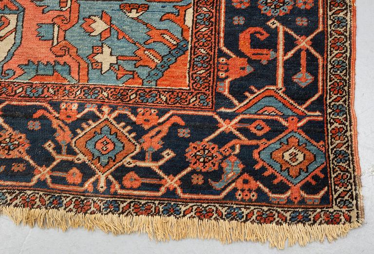 A carpet, an antique Heriz, ca 469,5-471 x 300-309,5 cm.
