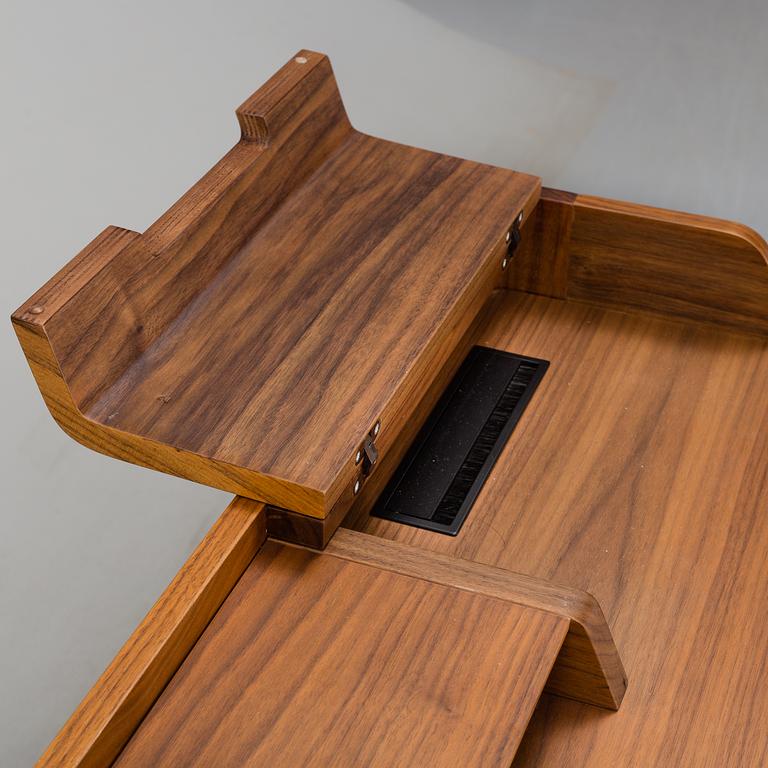 A 21st Century walnut 'Saffo' writing desk by Carlo Ballabio, from Porada.