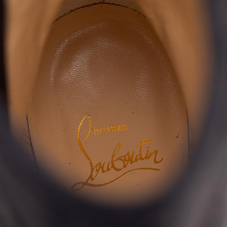 Christian Louboutin, a pair of suede and studs boots, size 36 1/2.