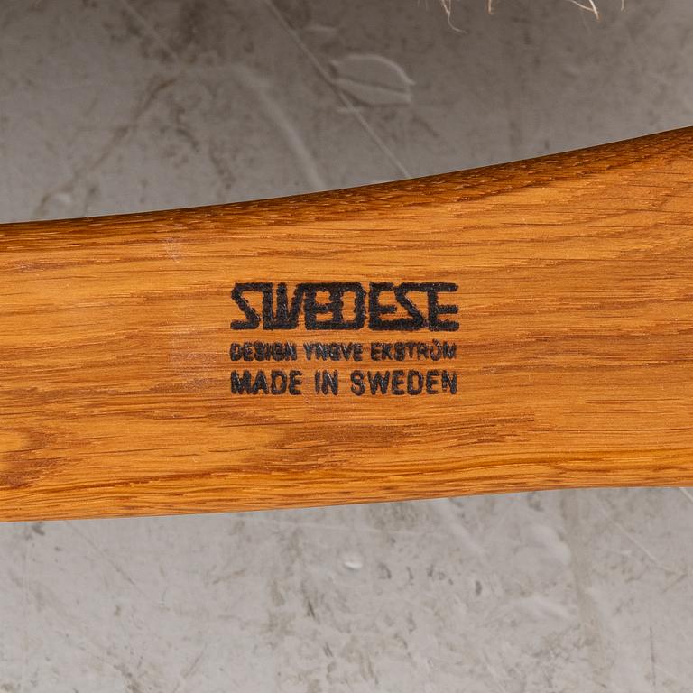 Yngve Ekström, a 'Lamino' armchair with footstool, Swedese, 2004.