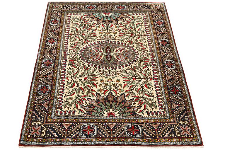 A rug, Sarouk, c. 220 x 144 cm.