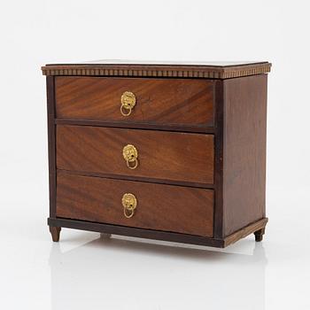 An Empire mahogany miniature commode, 19th Century.