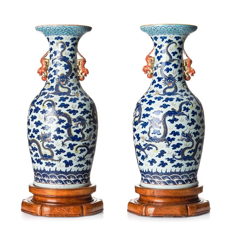 A pair of large five clawed dragon vases, Qing dynasty, 19th century.