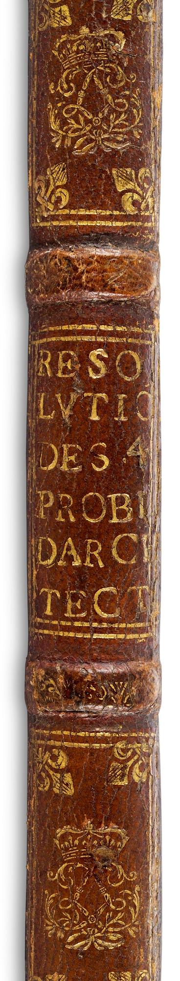 A Louis XIV leather-bound book cover.