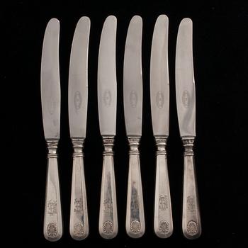 BESTICK, 6+6 "Musslan" silver, Helsingfors 1936-1950. Knivbladen stål. Sammanlagd vikt ca 748 g.