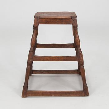 A 19th century folk-art stool.