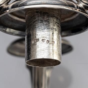 A pair of Swedish 19th century silver candelabra, marks of Gustaf Theodor Folcker, Stockholm 1871.