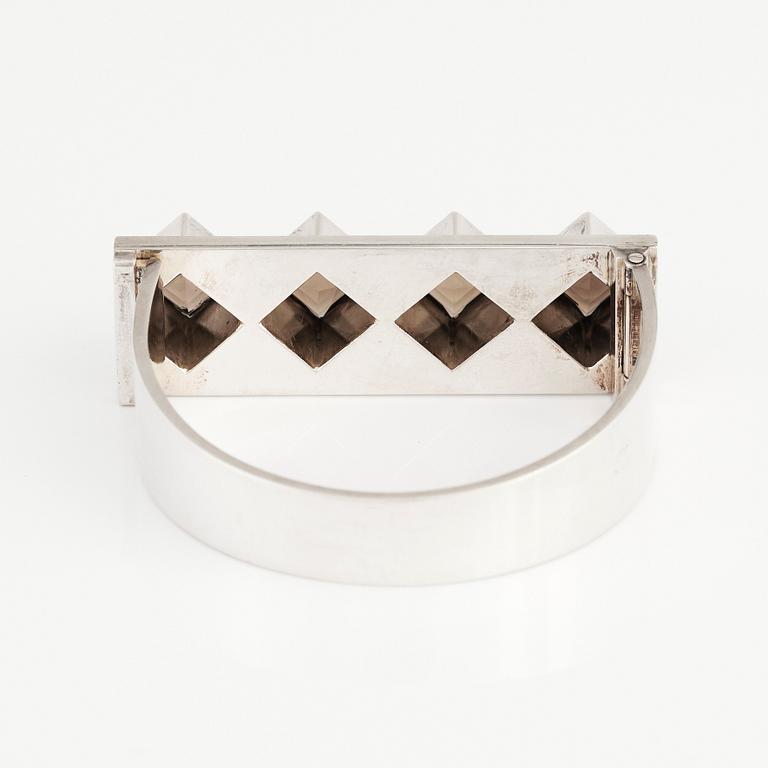 Sigurd Persson, a sterling silver, part gilt bangle with smoky qvartz (citrine), Stockholm 1963, executed by silversmith Peter Schmitt.