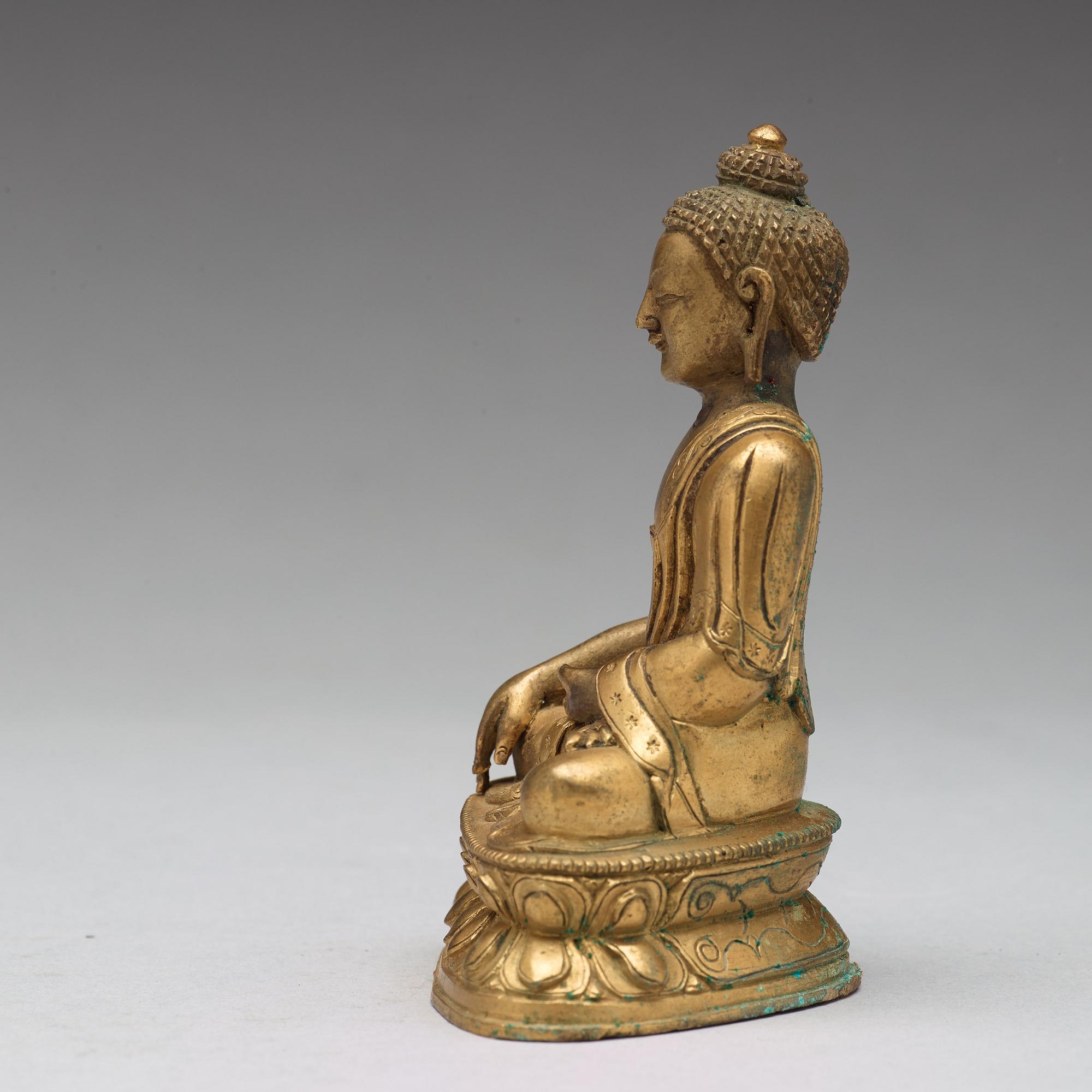 Two copper alloy figures of buddha, Sino-Tibetan, circa 1900.