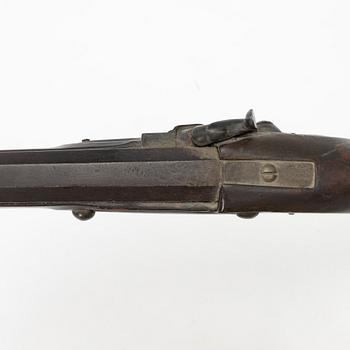 Percussion gun.