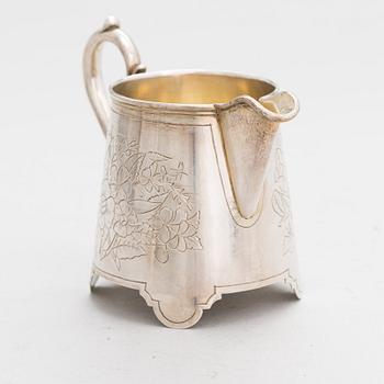 A Russian silver cream jug, Moscow, 1889. Later Estonian marks.