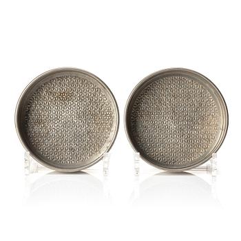 Firma Svenskt Tenn, a pair of pewter coasters, Stockholm 1975.