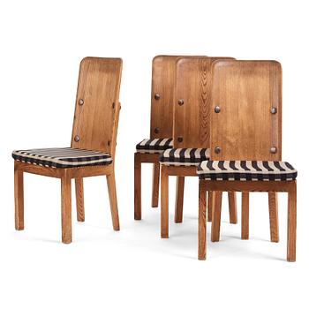 Axel Einar Hjorth, a set of four "Lovö" stained pine chairs, Nordiska Kompaniet 1930s.