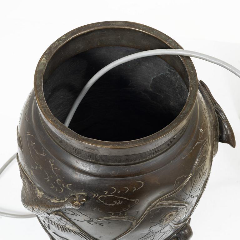 A Japanese bronze table lamp, 20th century.
